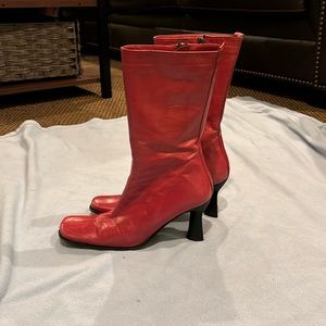 Red leather BCBG boots. Well worn but in great shape.